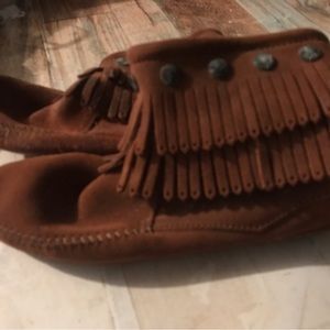 Minnetonka moccasins, size 7 1/2, never worn. 1 tier fringe